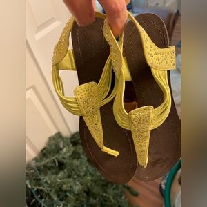 Yellow sandals with gems
